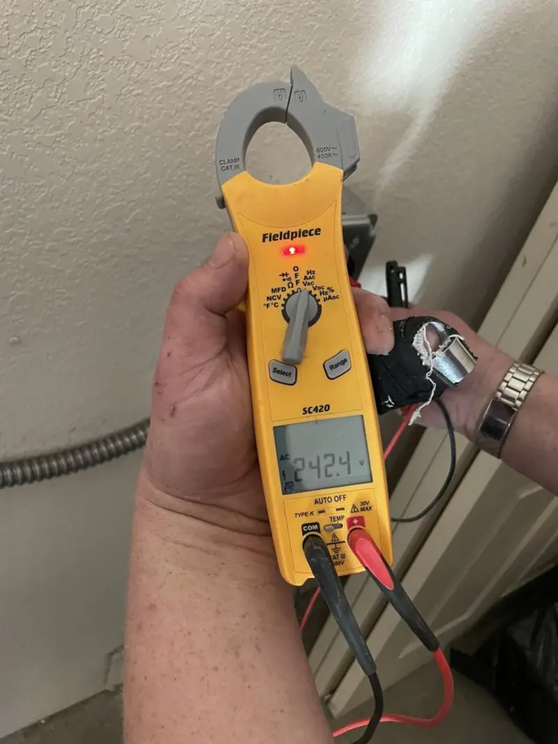 Voltage testing with clamp meter during Circuit Breaker Repair in Edgefield